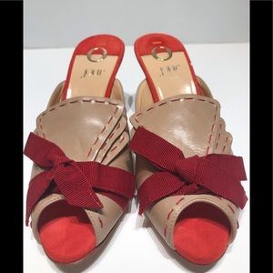 O Jour mid slide with red fabric bow and details